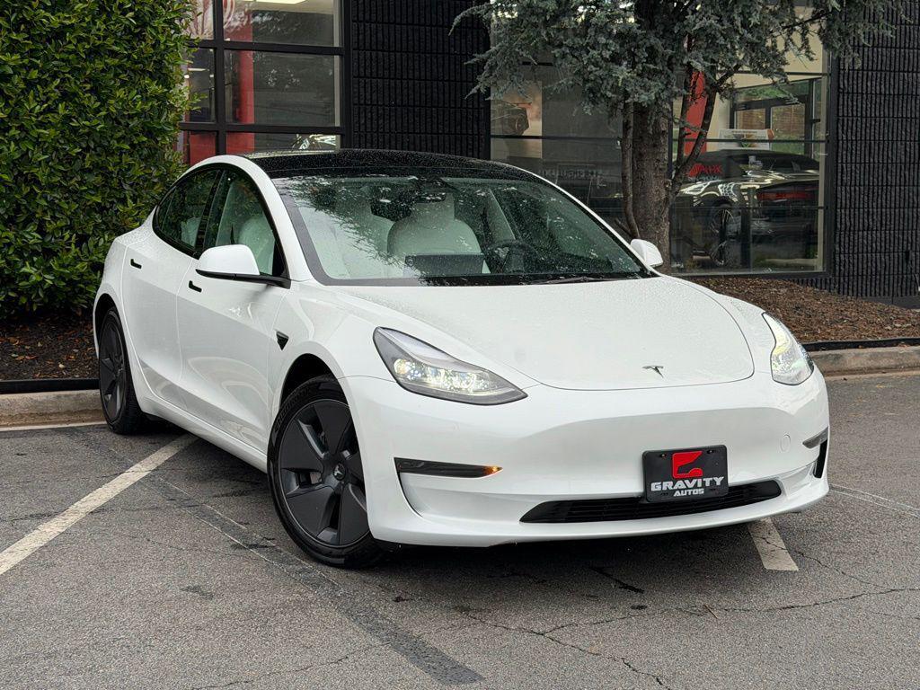 used 2023 Tesla Model 3 car, priced at $28,495