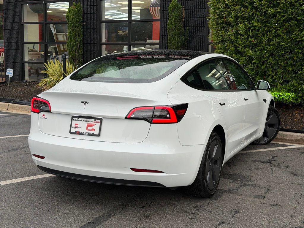 used 2023 Tesla Model 3 car, priced at $28,495