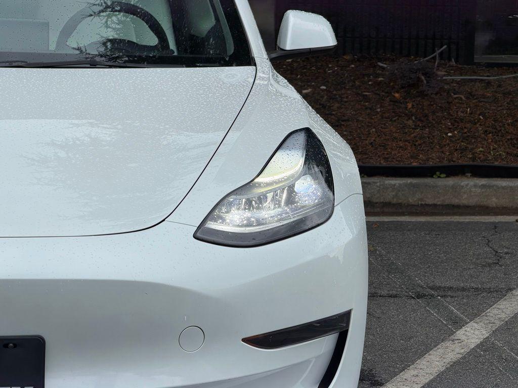 used 2023 Tesla Model 3 car, priced at $28,495