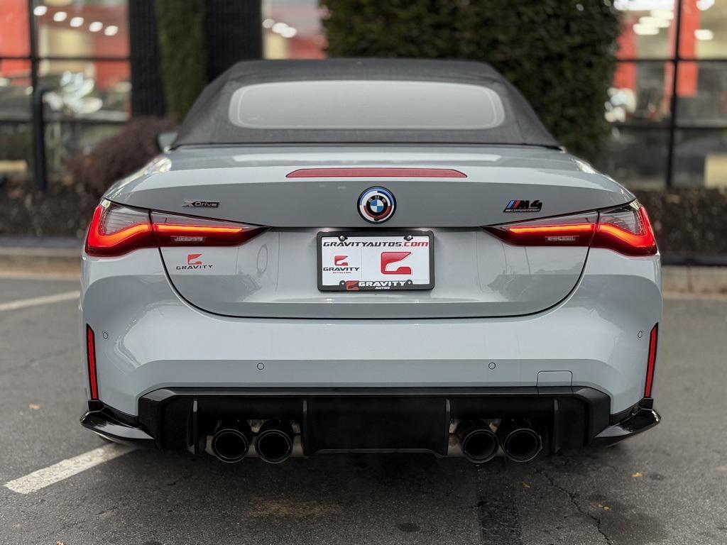 used 2023 BMW M4 car, priced at $68,895