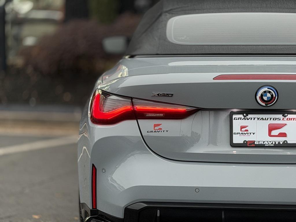 used 2023 BMW M4 car, priced at $68,895