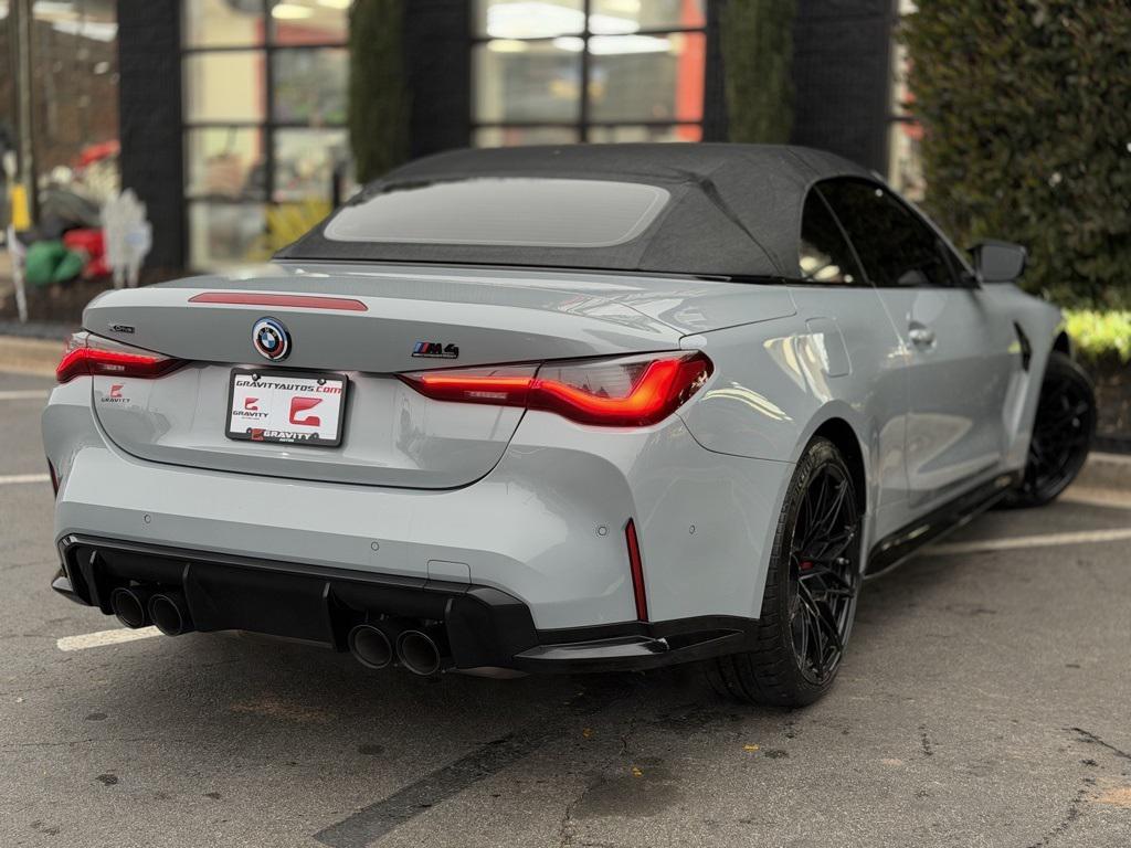 used 2023 BMW M4 car, priced at $68,895