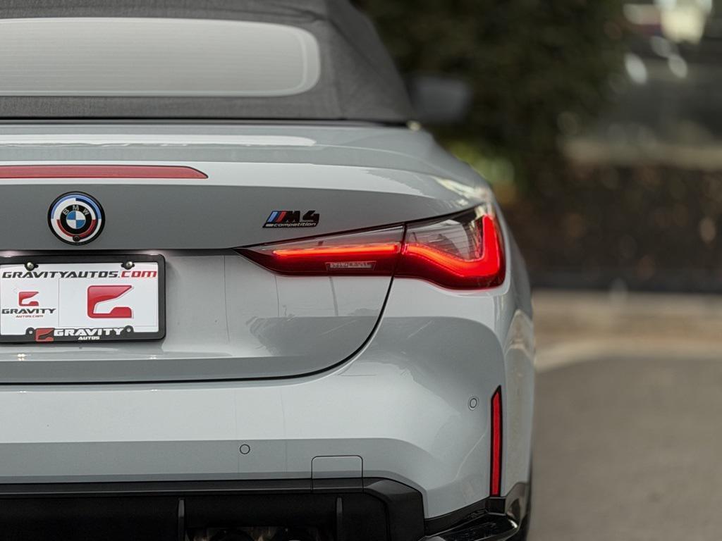 used 2023 BMW M4 car, priced at $68,895