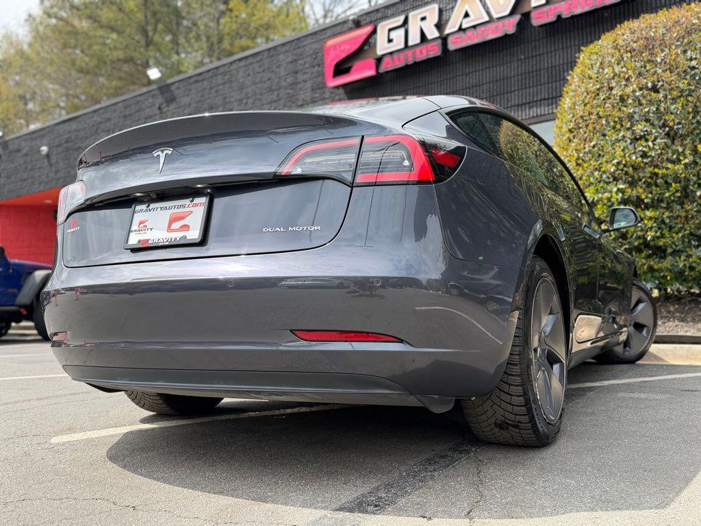 used 2022 Tesla Model 3 car, priced at $23,495