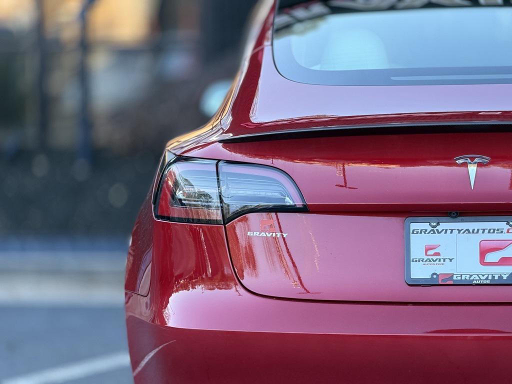 used 2023 Tesla Model 3 car, priced at $26,795