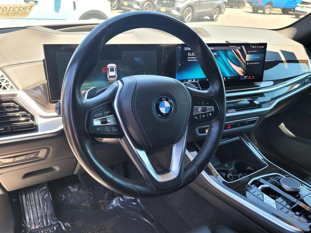 used 2025 BMW X5 PHEV car, priced at $54,573