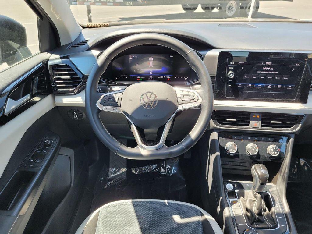 used 2025 Volkswagen Taos car, priced at $22,673