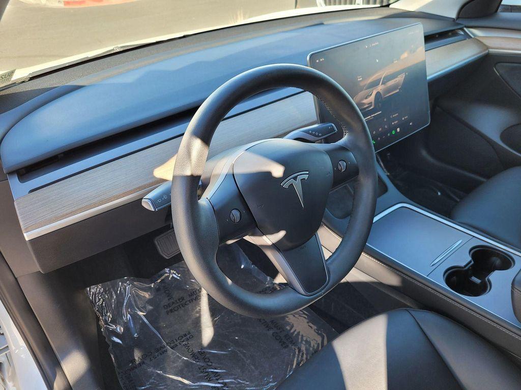 used 2023 Tesla Model 3 car, priced at $26,000