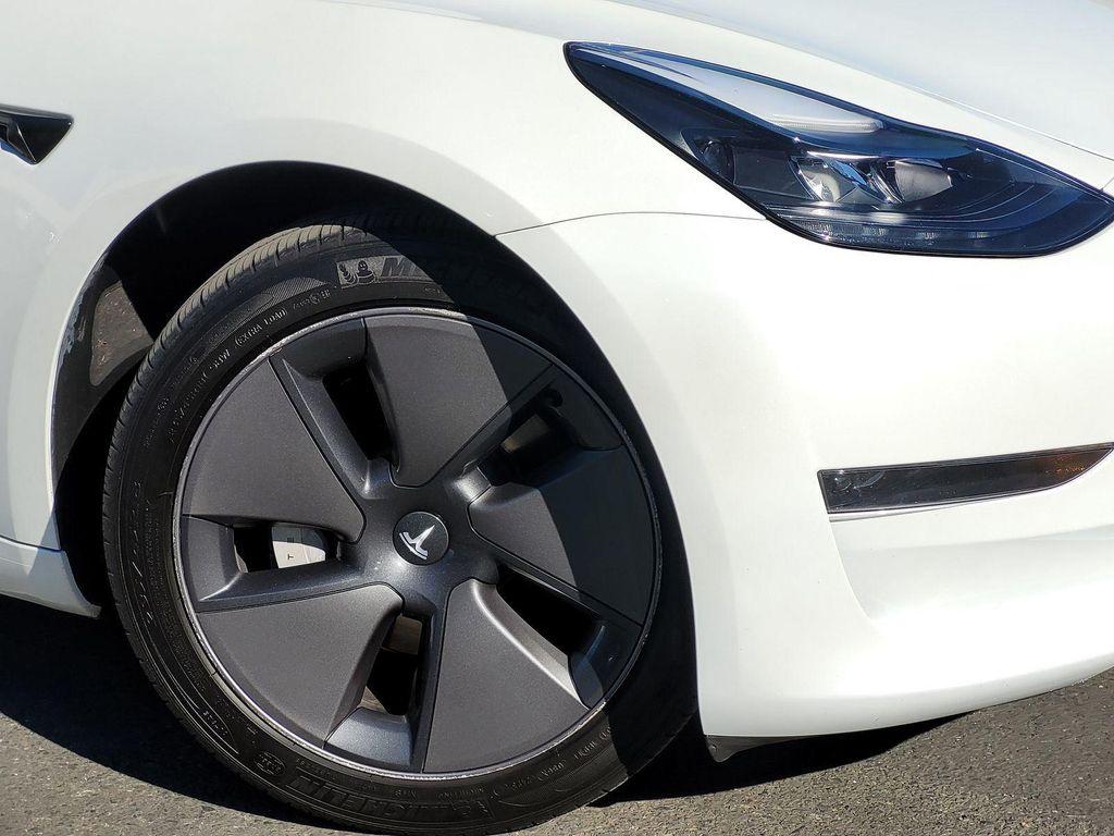 used 2023 Tesla Model 3 car, priced at $26,000