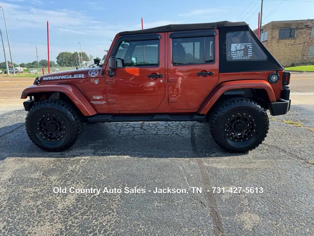 used 2014 Jeep Wrangler Unlimited car, priced at $13,988