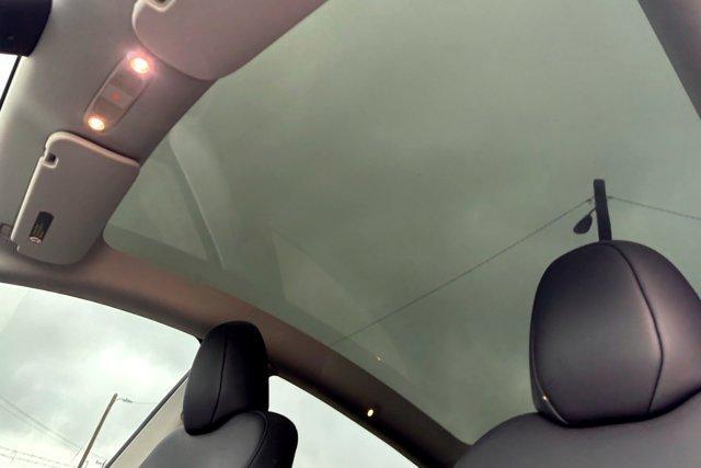 used 2025 Tesla Model Y car, priced at $39,977