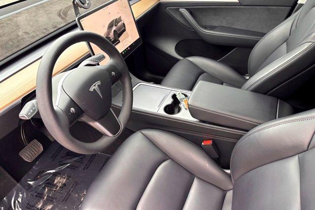 used 2025 Tesla Model Y car, priced at $39,977