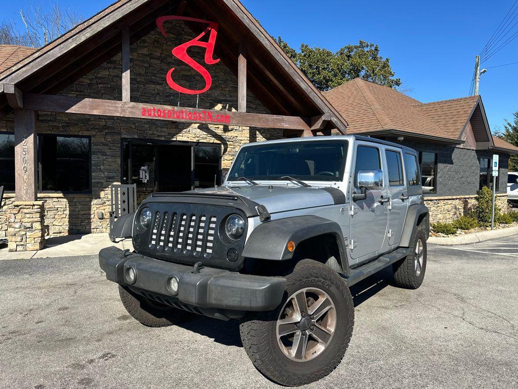 used 2011 Jeep Wrangler Unlimited car, priced at $13,741