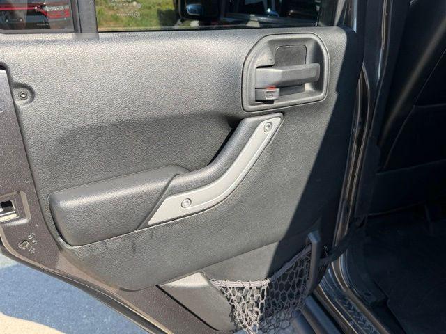used 2017 Jeep Wrangler Unlimited car, priced at $18,186