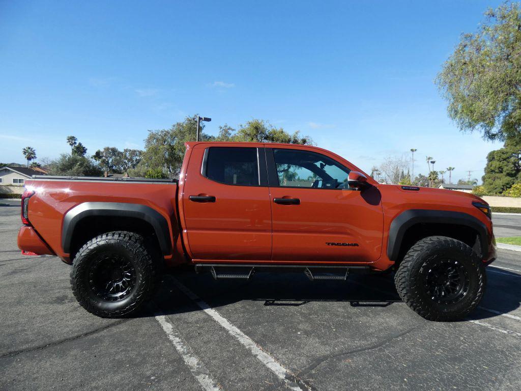 used 2025 Toyota Tacoma Hybrid car, priced at $53,899