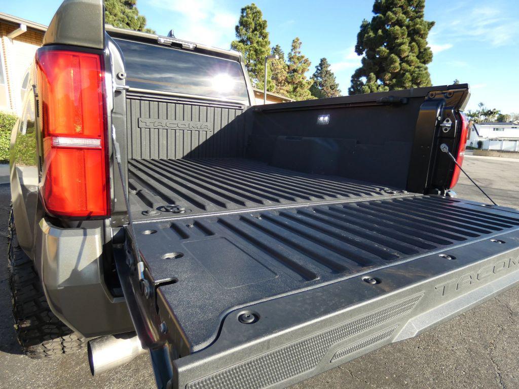 used 2025 Toyota Tacoma car, priced at $49,990