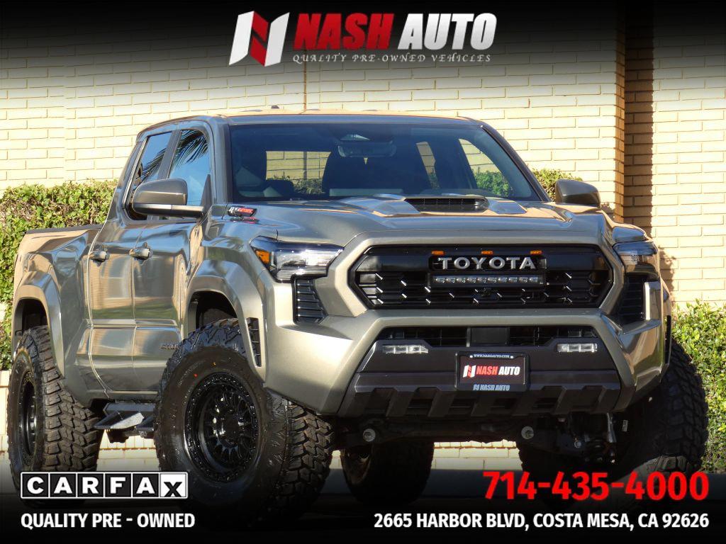 used 2025 Toyota Tacoma car, priced at $49,990