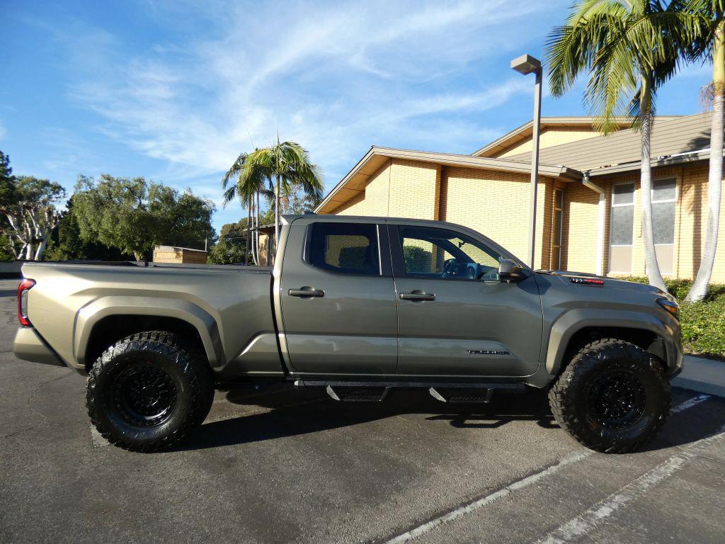 used 2025 Toyota Tacoma car, priced at $49,990