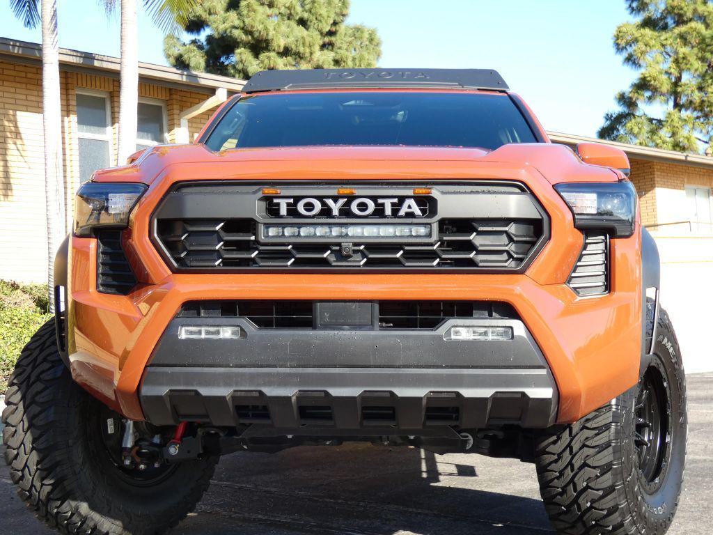 used 2025 Toyota Tacoma car, priced at $48,990