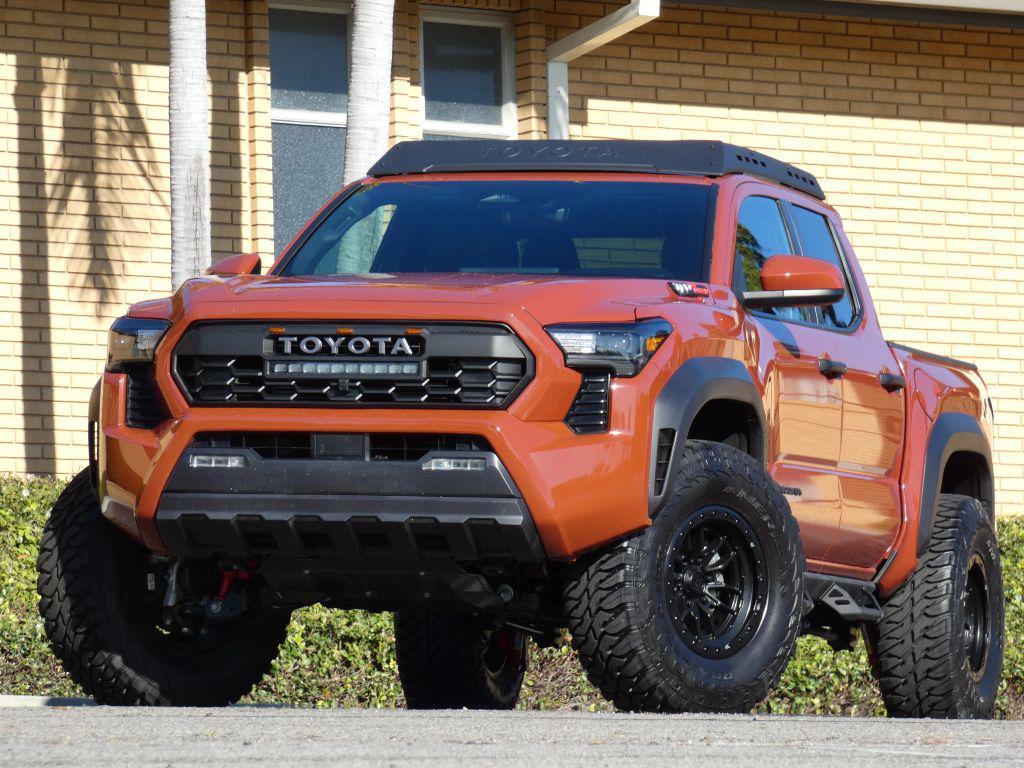 used 2025 Toyota Tacoma car, priced at $48,990