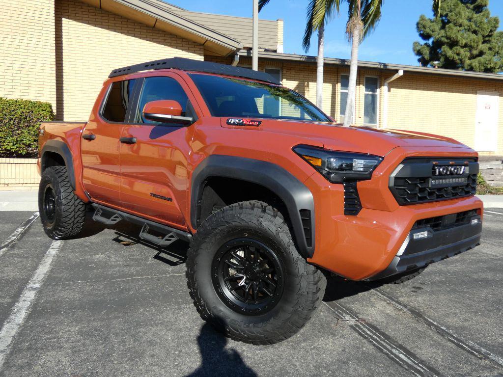 used 2025 Toyota Tacoma car, priced at $48,990
