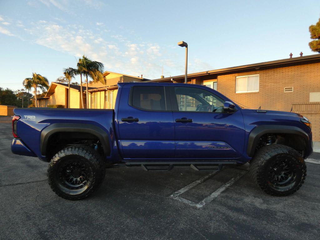 used 2025 Toyota Tacoma Hybrid car, priced at $49,990