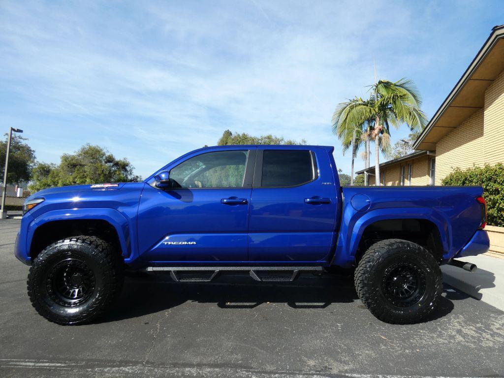 used 2025 Toyota Tacoma car, priced at $40,990