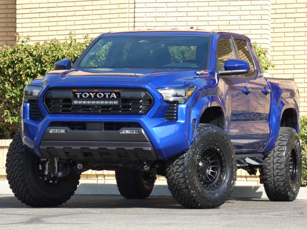 used 2025 Toyota Tacoma car, priced at $40,990