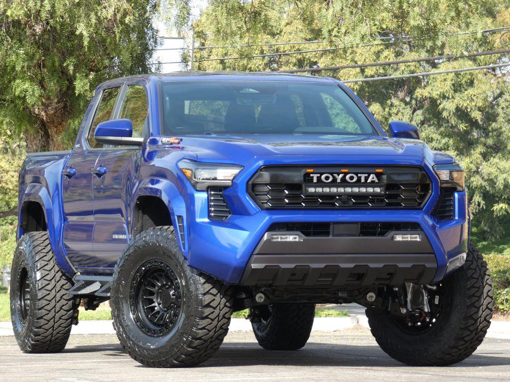used 2025 Toyota Tacoma car, priced at $40,990