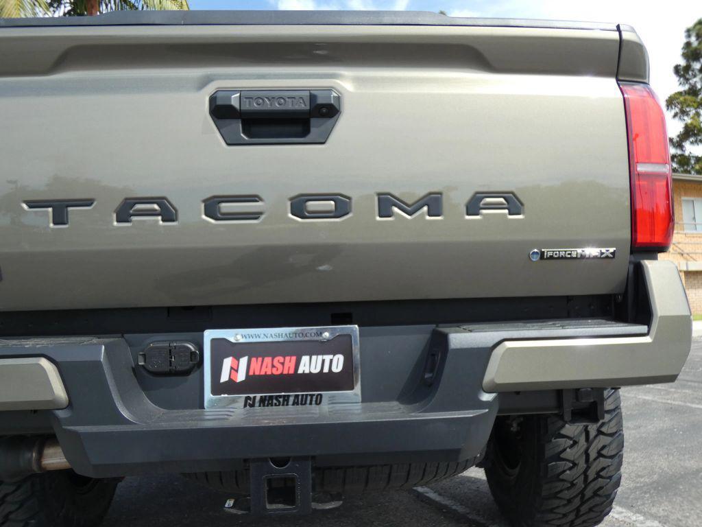 used 2025 Toyota Tacoma Hybrid car, priced at $49,990