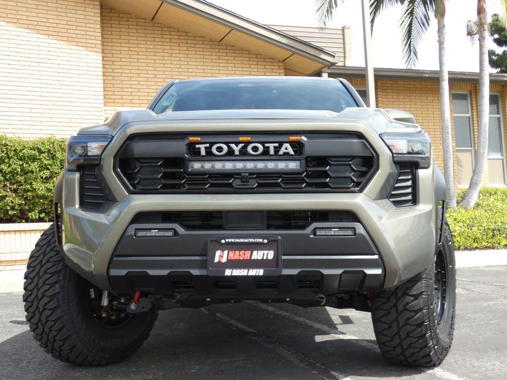 used 2025 Toyota Tacoma Hybrid car, priced at $49,990