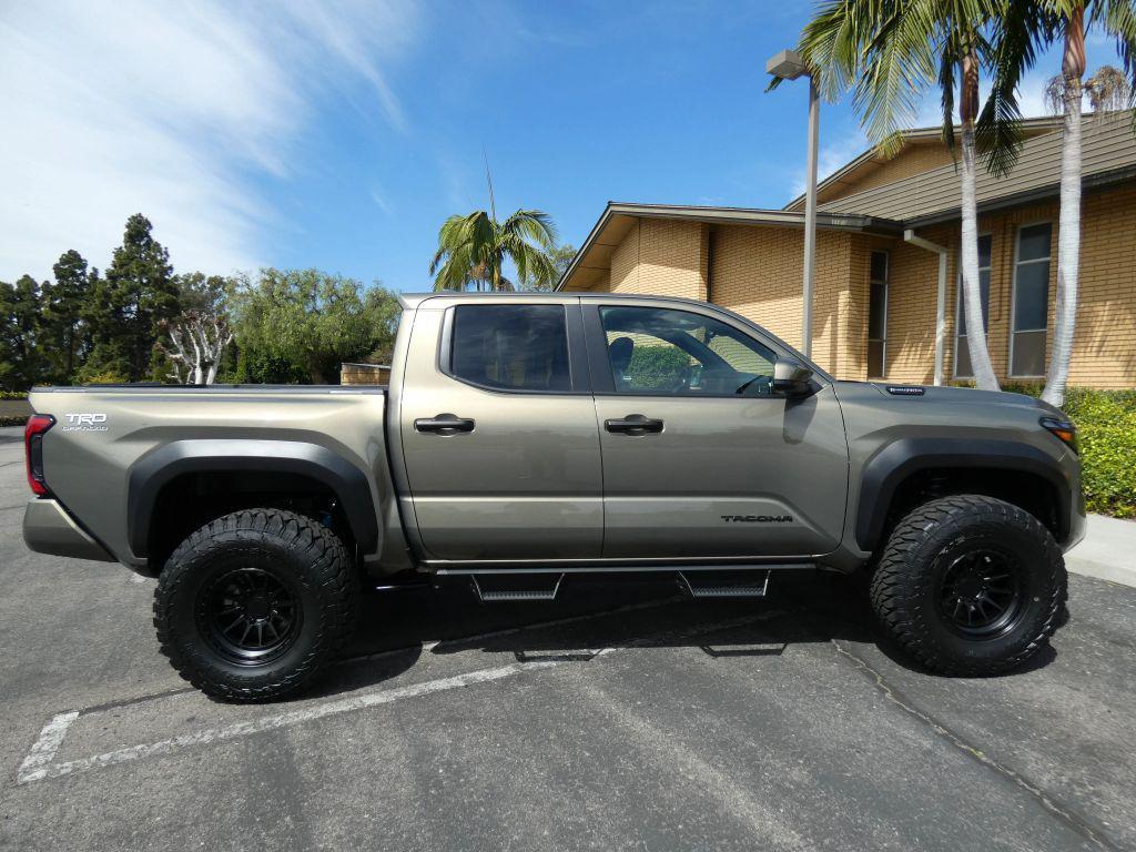 used 2025 Toyota Tacoma Hybrid car, priced at $49,990