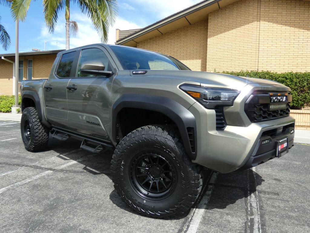 used 2025 Toyota Tacoma Hybrid car, priced at $49,990