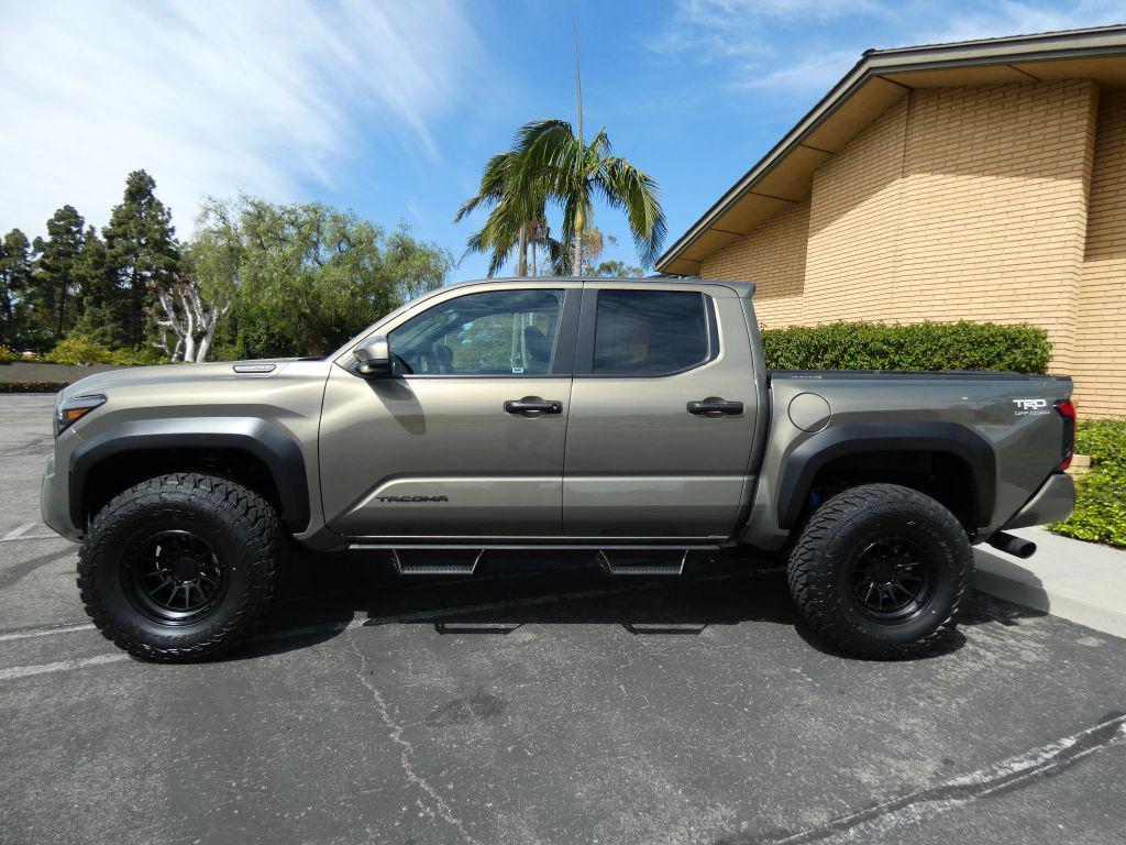used 2025 Toyota Tacoma Hybrid car, priced at $49,990