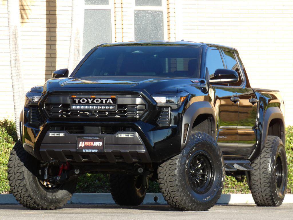 used 2025 Toyota Tacoma Hybrid car, priced at $52,990