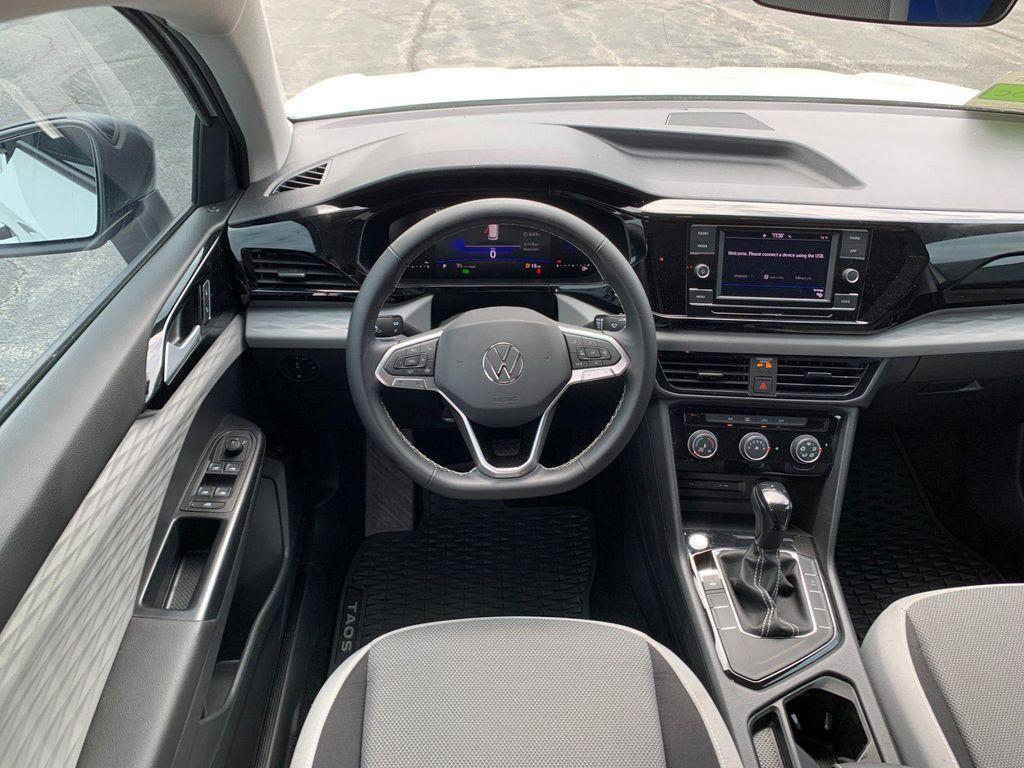 used 2023 Volkswagen Taos car, priced at $18,499