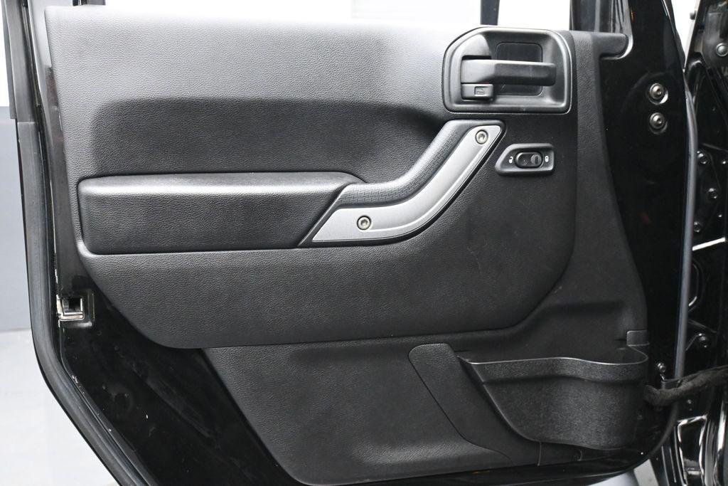 used 2016 Jeep Wrangler Unlimited car, priced at $22,241