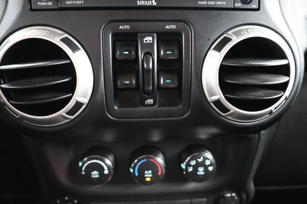 used 2016 Jeep Wrangler Unlimited car, priced at $22,241