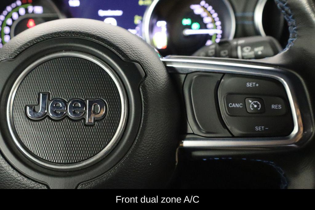used 2023 Jeep Wrangler 4xe car, priced at $35,597