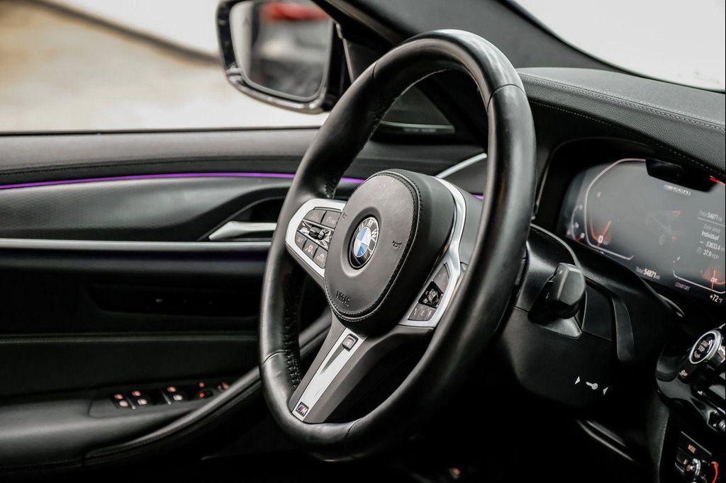 used 2023 BMW M550 car, priced at $52,299