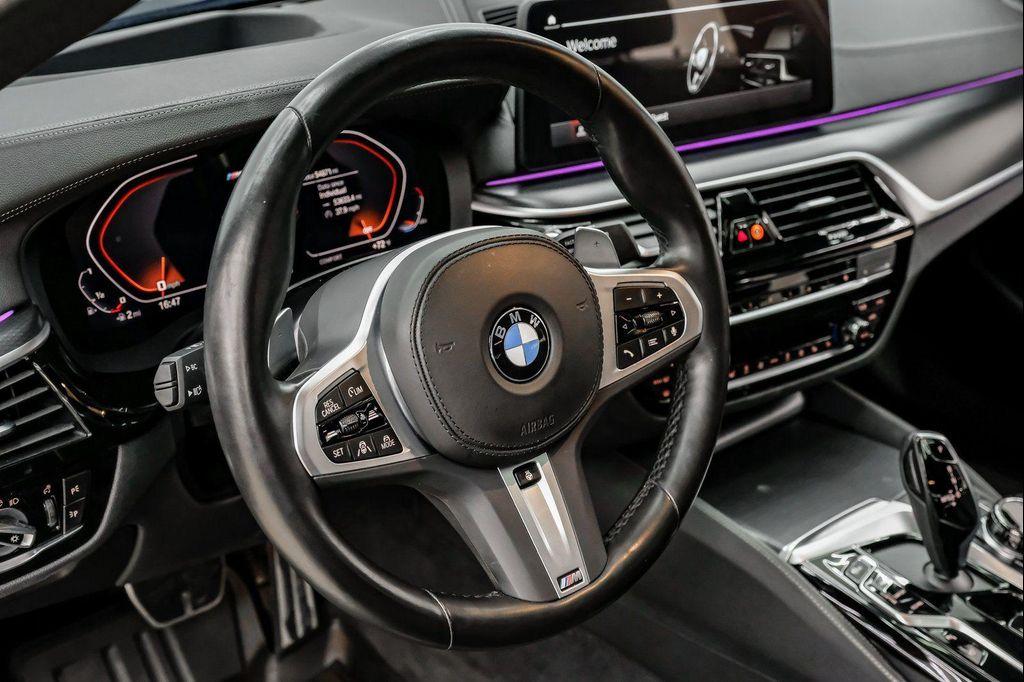 used 2023 BMW M550 car, priced at $52,299