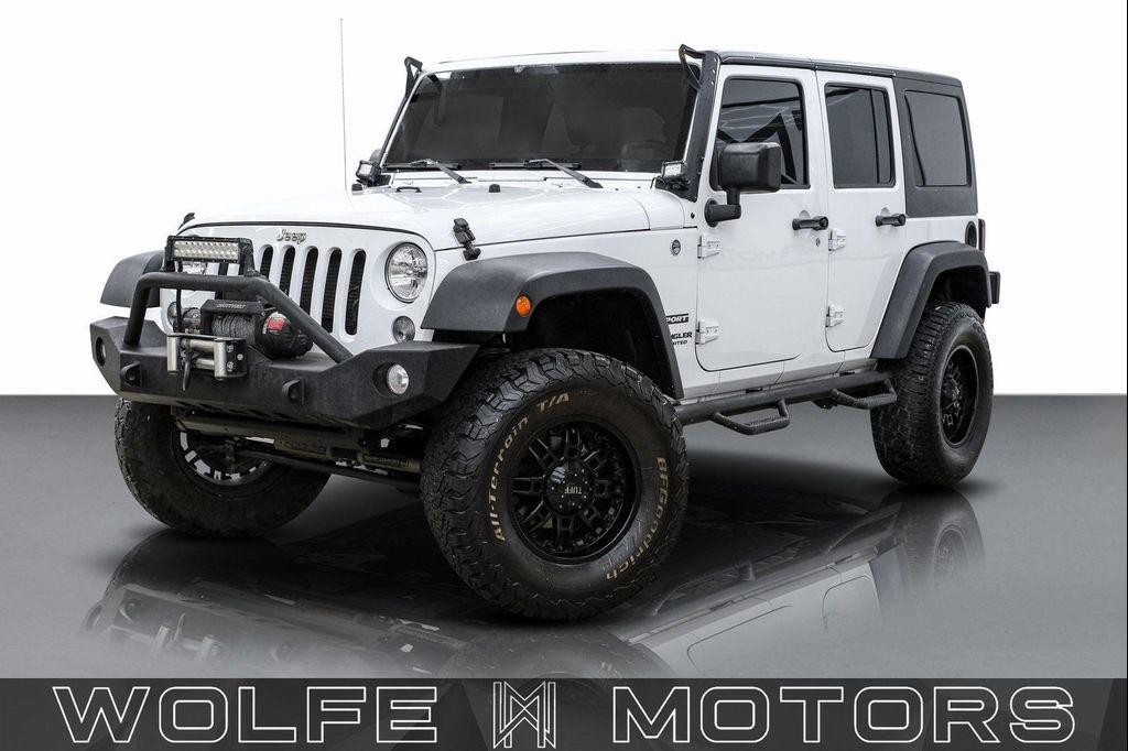 used 2015 Jeep Wrangler Unlimited car, priced at $14,799