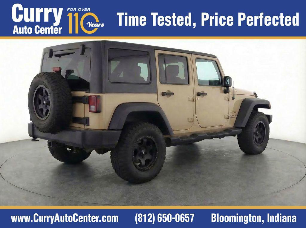 used 2013 Jeep Wrangler Unlimited car, priced at $10,596