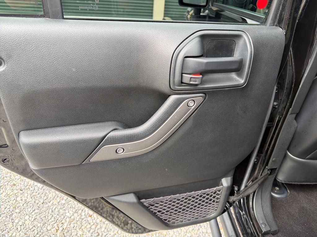 used 2018 Jeep Wrangler JK Unlimited car, priced at $24,395