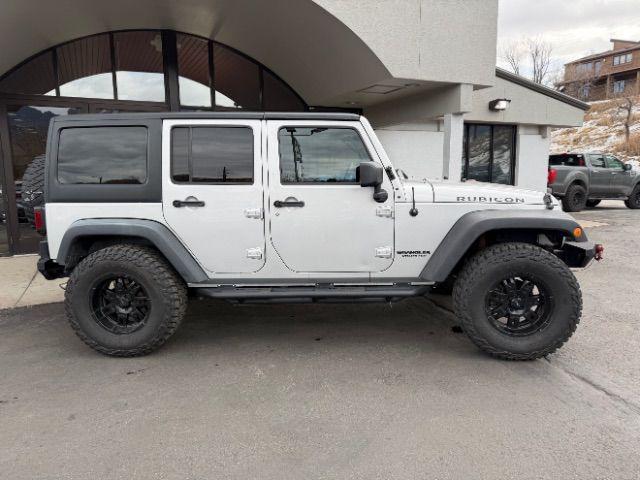 used 2012 Jeep Wrangler Unlimited car, priced at $16,900