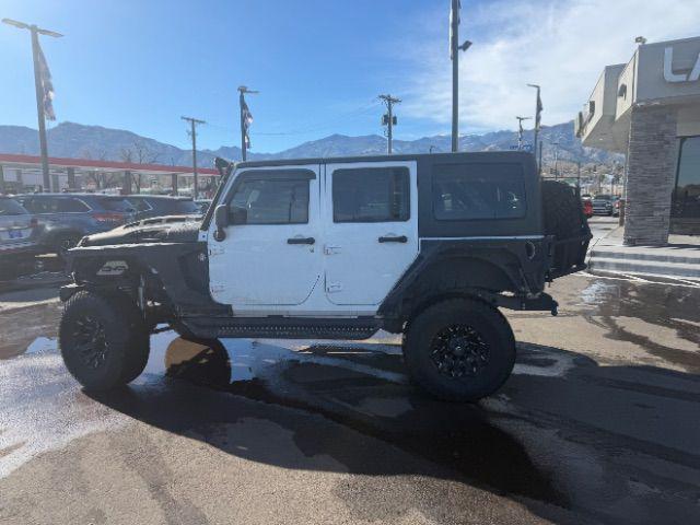 used 2015 Jeep Wrangler Unlimited car, priced at $24,400