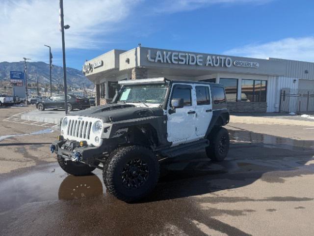 used 2015 Jeep Wrangler Unlimited car, priced at $24,400