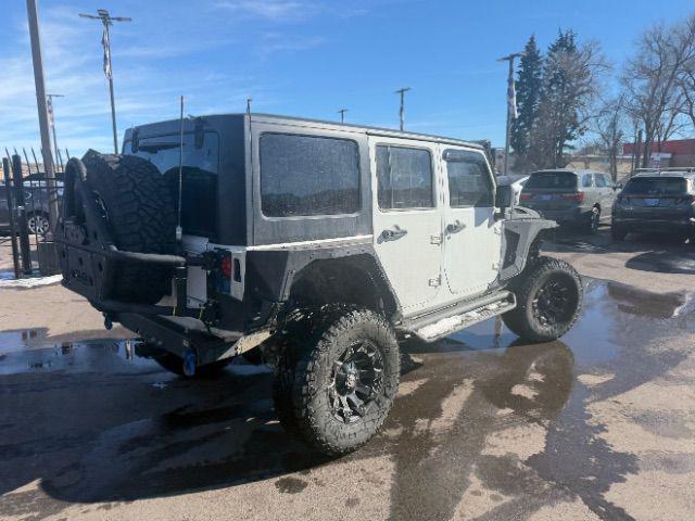 used 2015 Jeep Wrangler Unlimited car, priced at $24,400