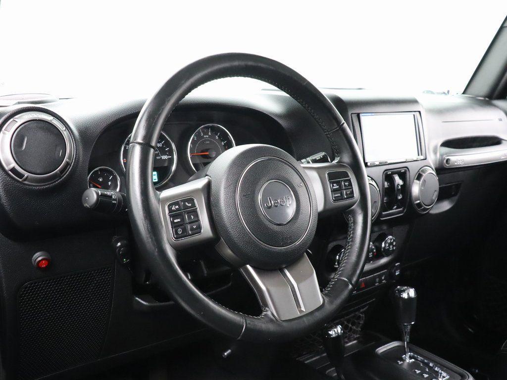 used 2018 Jeep Wrangler JK Unlimited car, priced at $24,631