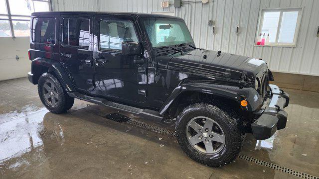 used 2011 Jeep Wrangler Unlimited car, priced at $12,900